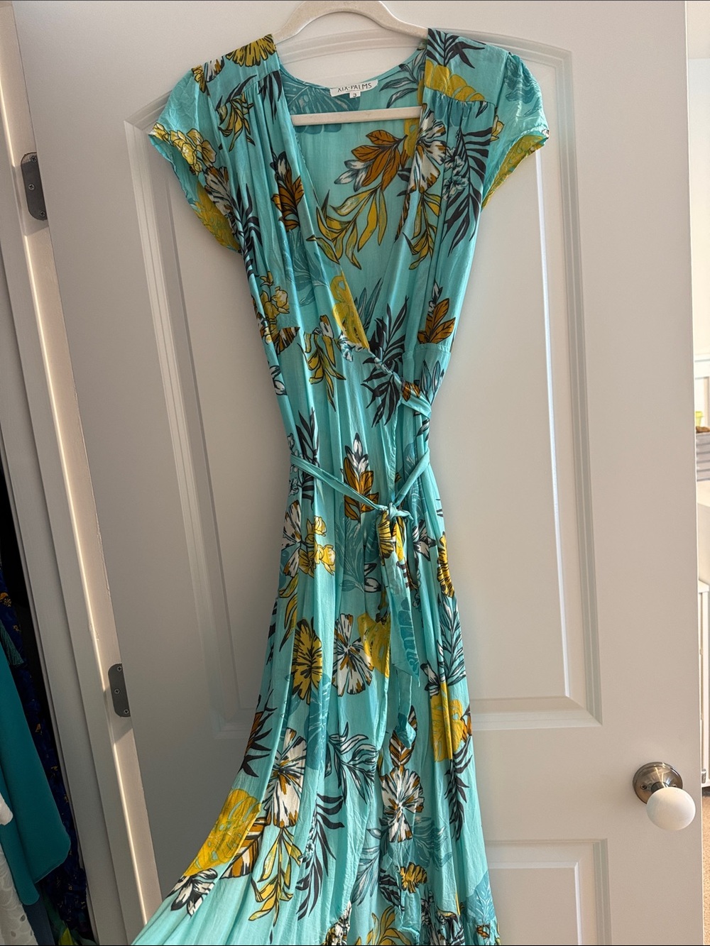 XIX PALMS // Molokai Wrap Dress in Light Teal with Yellow Floral Hawaiian Accent
